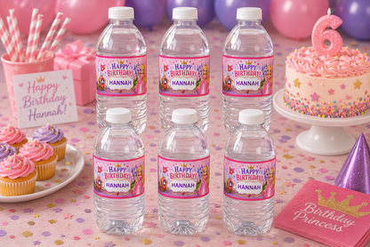Birthday party setup with water bottles labeled 'Happy Birthday Hannah' and a cake.